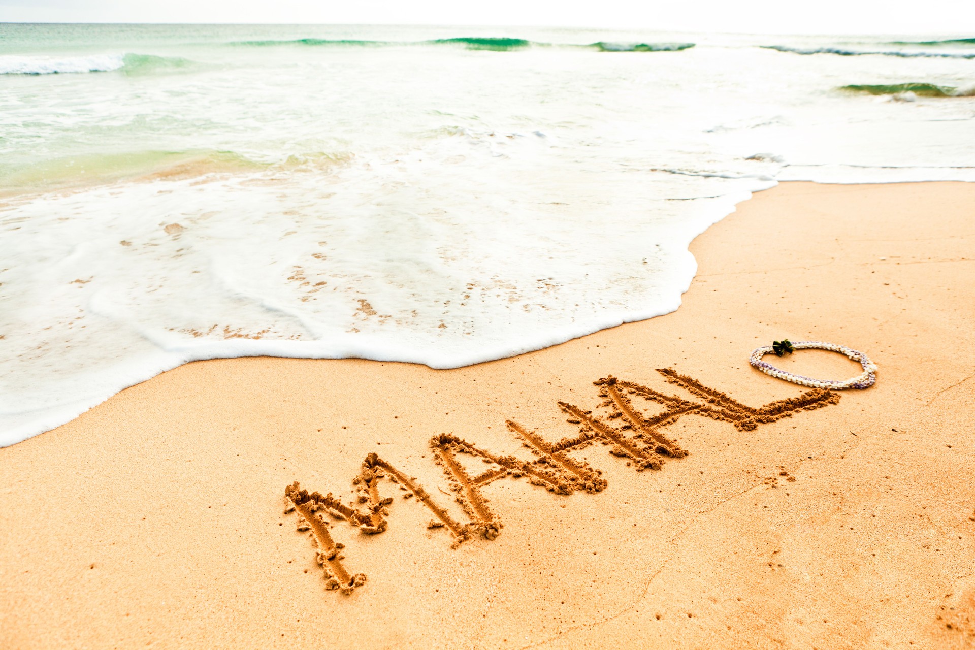 "MAHALO" Hawaiian Word for Thank You on Beach Sand